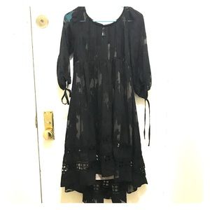 Anthropologie black and nude high low swing dress